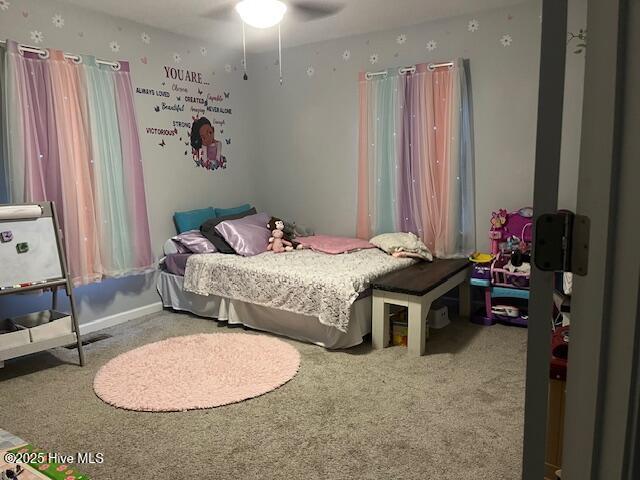 bedroom featuring carpet floors and ceiling fan