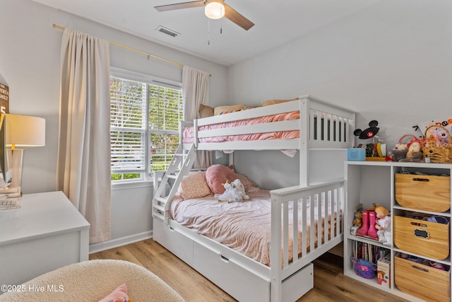 bedroom featuring ceiling fan and light wood-type flooring