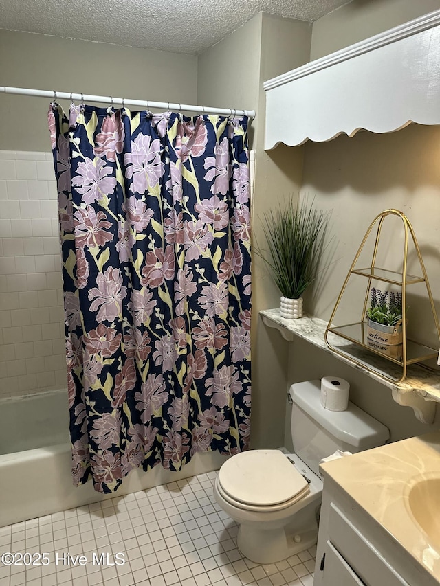 full bathroom featuring vanity, shower / bath combo, a textured ceiling, tile patterned floors, and toilet