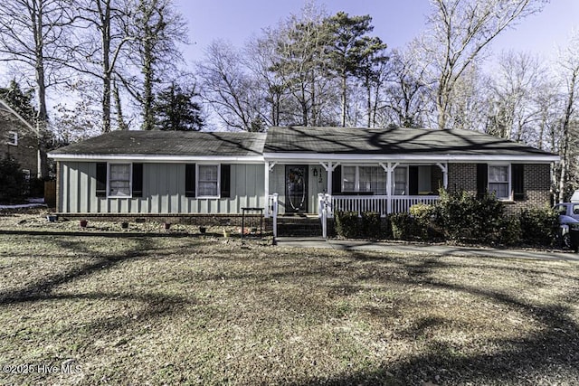 ranch-style home featuring a porch and board and batten siding