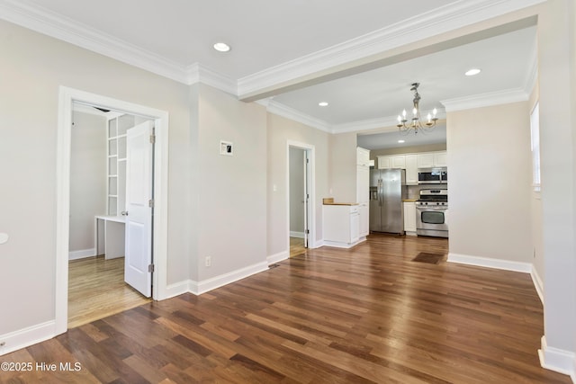 unfurnished living room featuring an inviting chandelier, recessed lighting, baseboards, and dark wood-type flooring