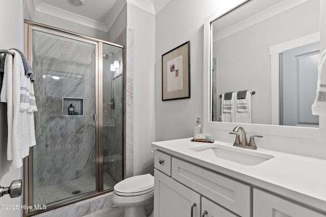 bathroom with ornamental molding, toilet, an enclosed shower, and vanity