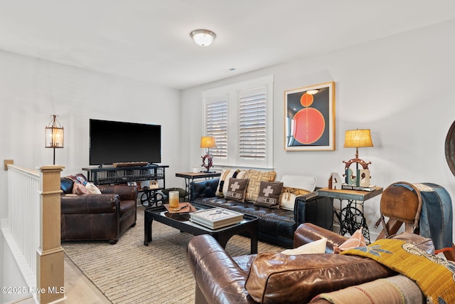 living room with light hardwood / wood-style floors