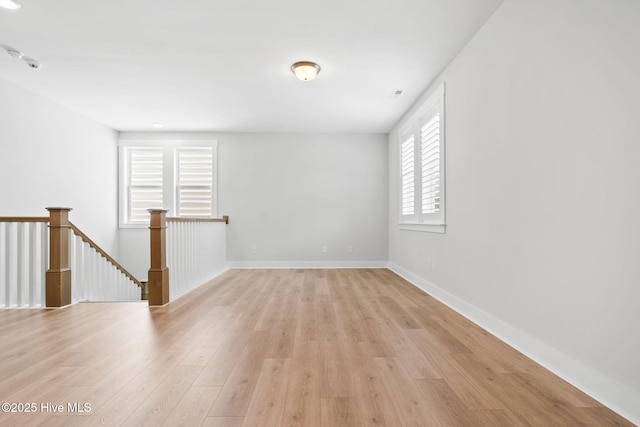 3836 Mason Port Dr, Wilmington, NC 28409 - empty room with light wood finished floors and baseboards