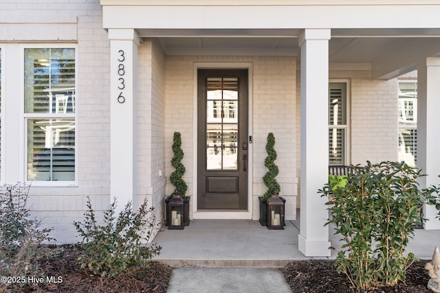 property entrance with a porch