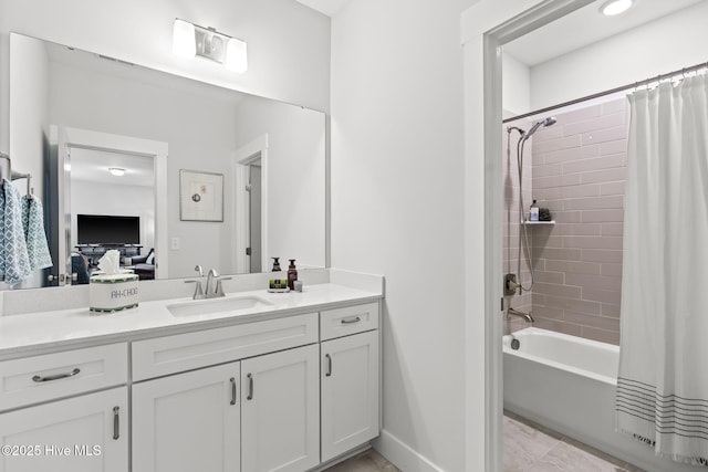 bathroom with tile patterned floors, vanity, and shower / bath combo with shower curtain