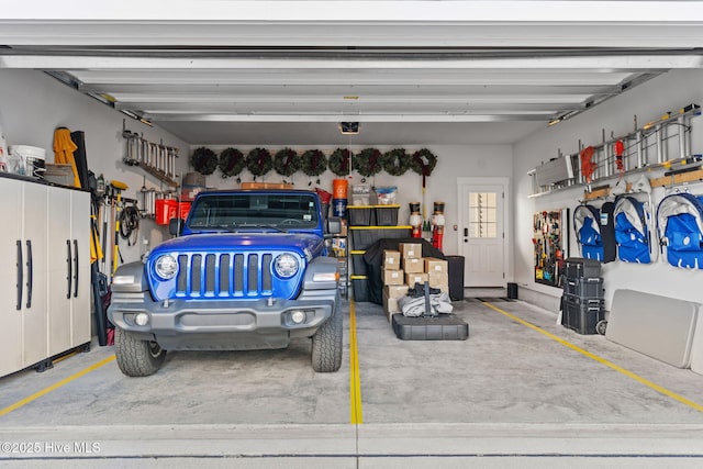 garage featuring a garage door opener