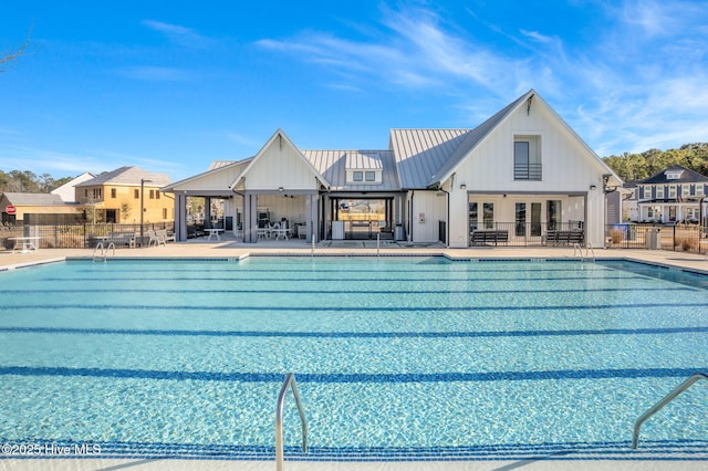 view of swimming pool with a patio area