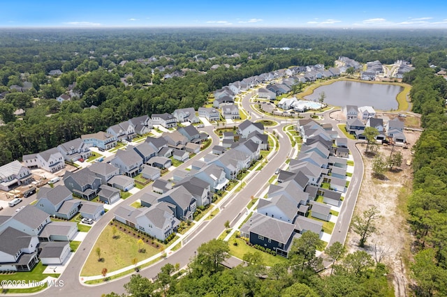 3836 Mason Port Dr, Wilmington, NC 28409 - aerial perspective of suburban area featuring a forest and a large body of water