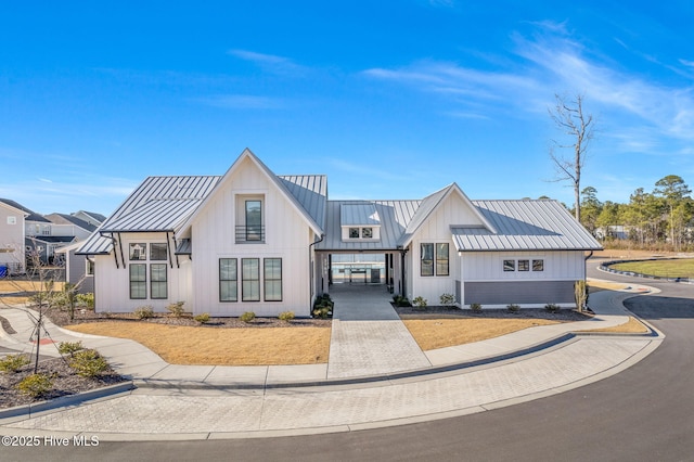 modern farmhouse style home featuring a carport