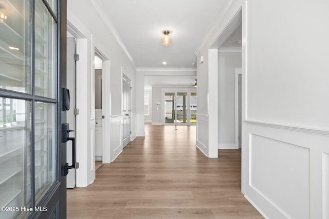 3836 Mason Port Dr, Wilmington, NC 28409 - foyer entrance featuring ornamental molding, light wood-style floors, and ceiling fan