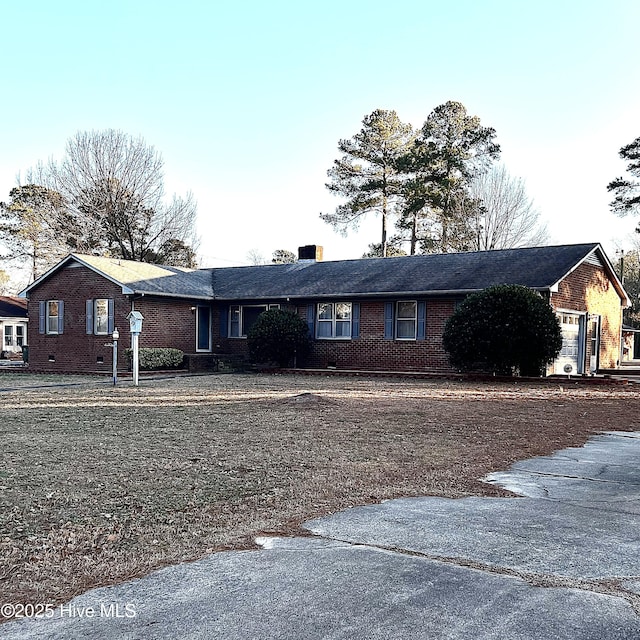 ranch-style home with a garage