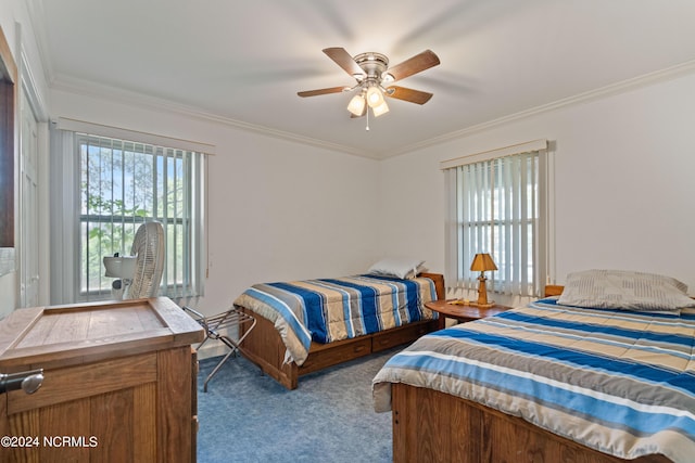 bedroom with ceiling fan, ornamental molding, and light carpet