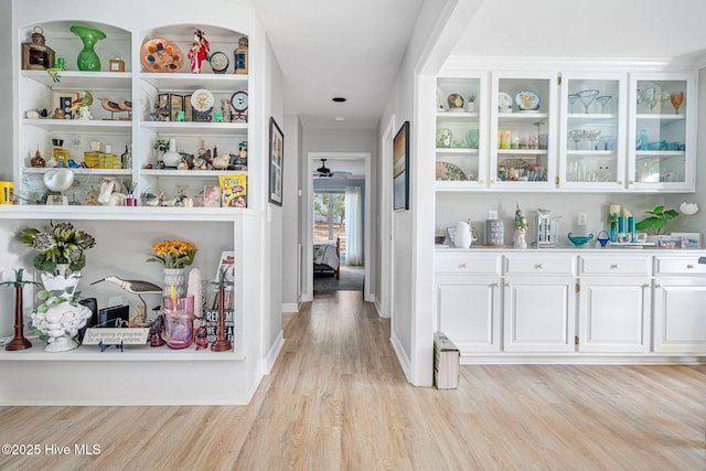 hall with light hardwood / wood-style flooring