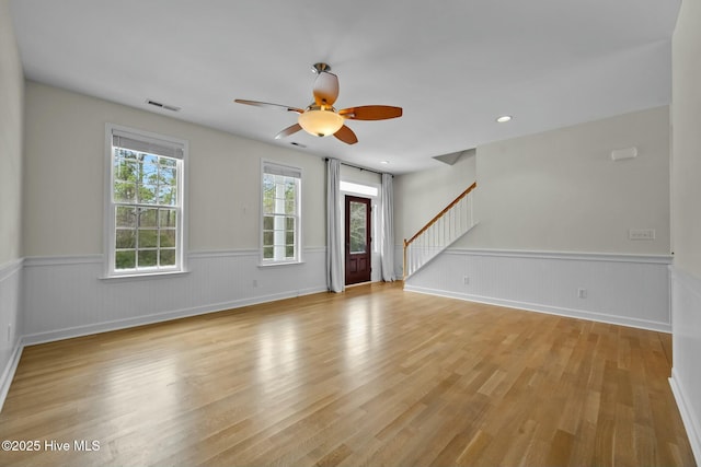 interior space featuring ceiling fan and light hardwood / wood-style flooring