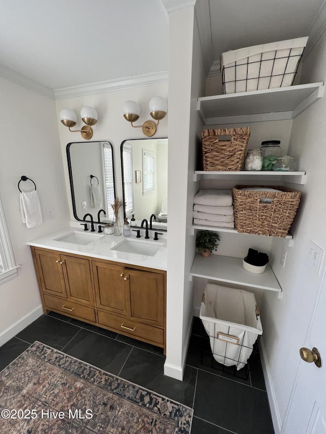 bathroom featuring tile patterned flooring, vanity, and ornamental molding