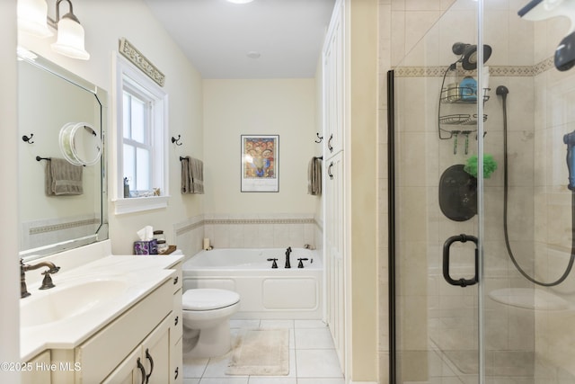 full bathroom with vanity, tile patterned floors, independent shower and bath, and toilet