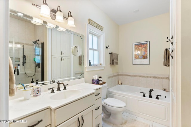 full bathroom featuring vanity, tile patterned flooring, independent shower and bath, and toilet