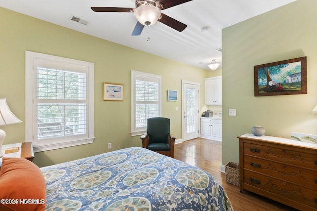 bedroom featuring hardwood / wood-style floors and ceiling fan