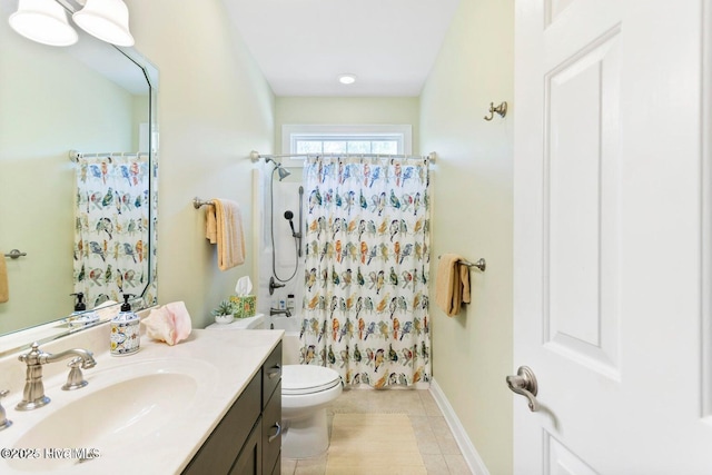 bathroom with vanity, a shower with curtain, tile patterned floors, and toilet