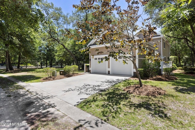 view of property exterior featuring a garage and a lawn