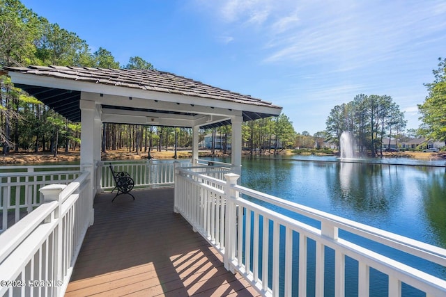 dock area featuring a gazebo and a water view