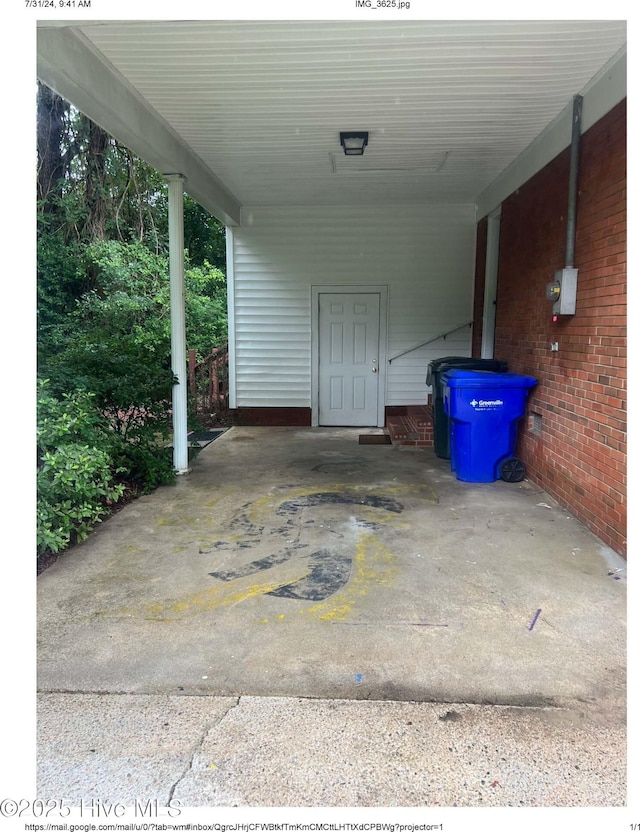 view of patio / terrace with a carport