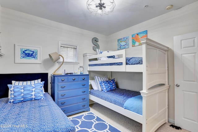 bedroom featuring light carpet