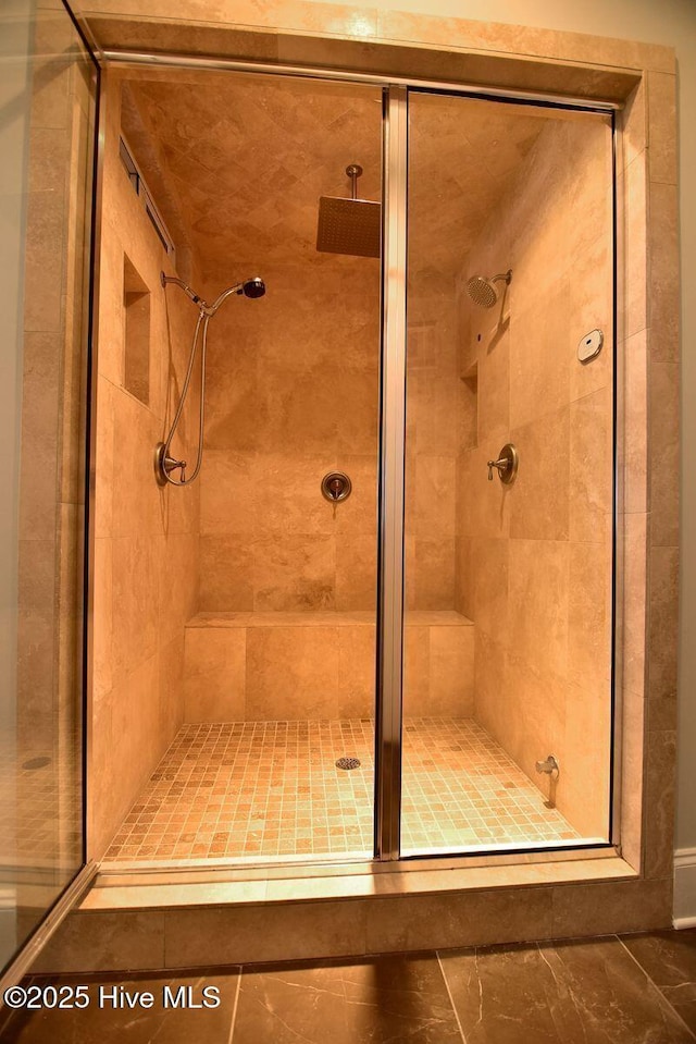 bathroom with an enclosed shower