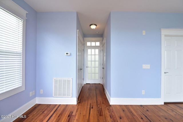 entrance foyer with dark wood-type flooring