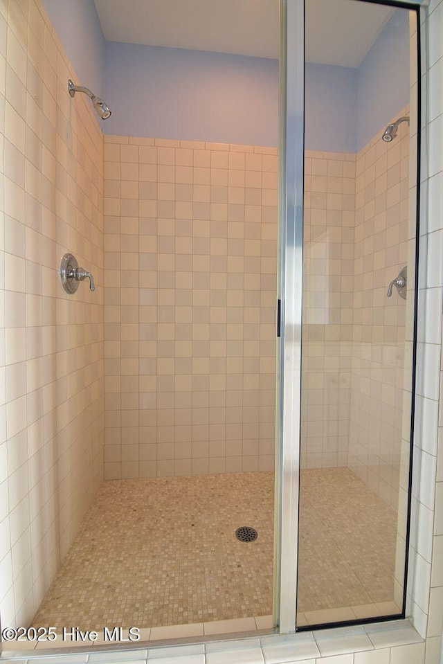 bathroom with an enclosed shower