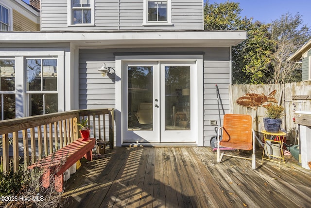 wooden deck featuring fence