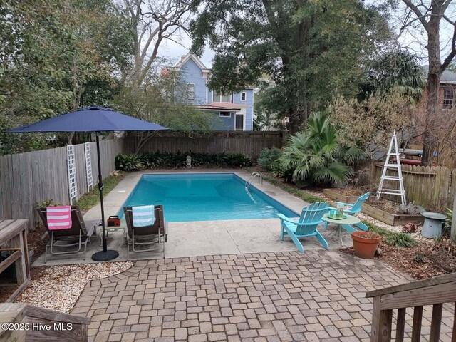 back of house featuring a patio area and french doors