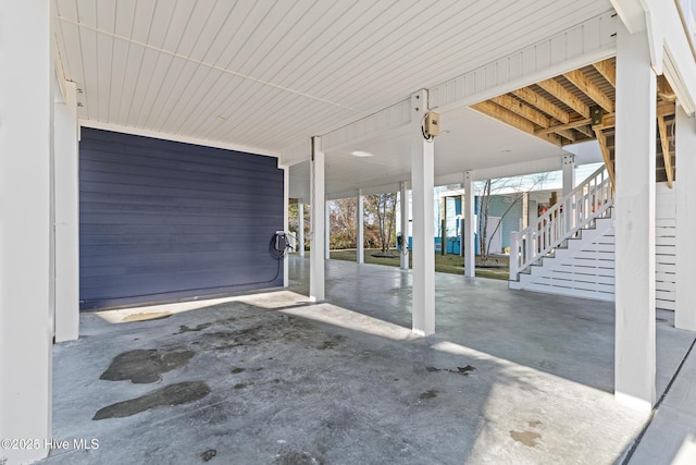 view of patio / terrace featuring a carport