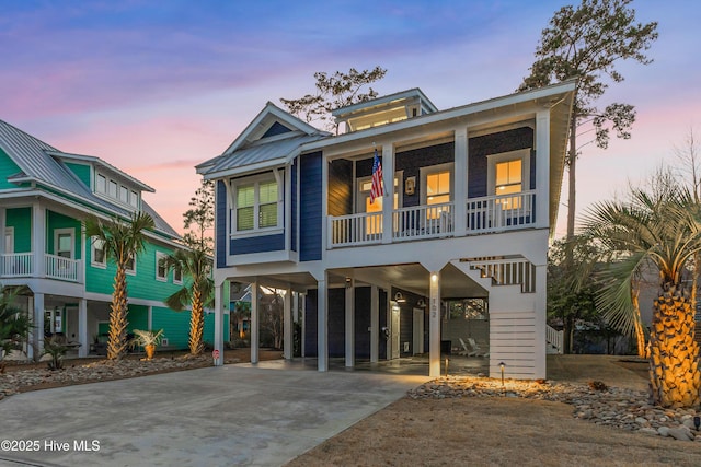 coastal home featuring a carport