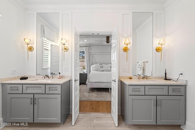 bathroom featuring vanity and wood-type flooring