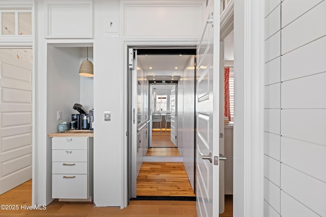 interior space with light hardwood / wood-style flooring