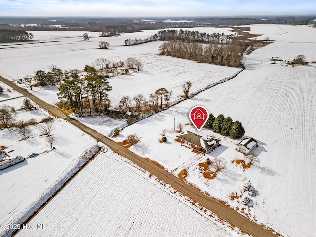 snowy aerial view with a rural view