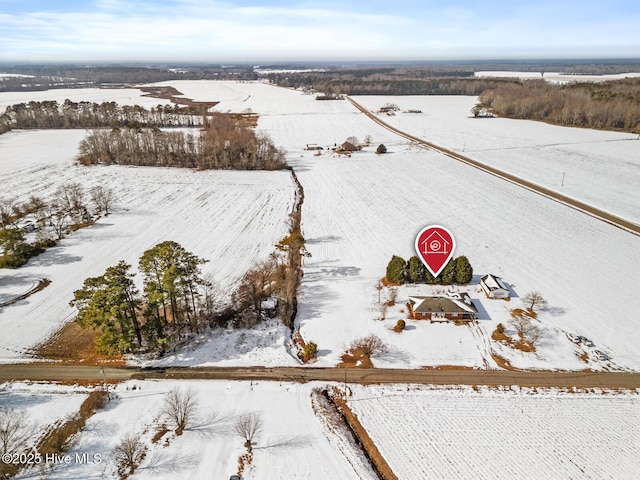 snowy aerial view with a rural view