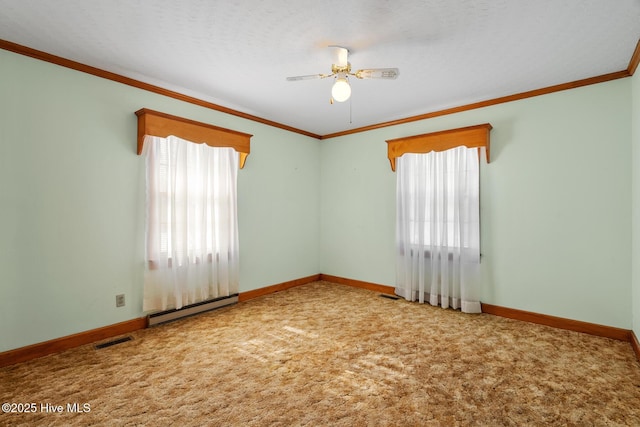 carpeted empty room with a baseboard radiator, ornamental molding, and ceiling fan