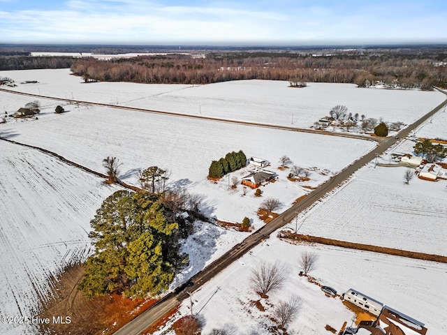 snowy aerial view featuring a rural view