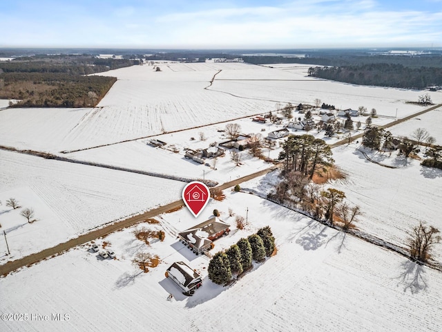 snowy aerial view featuring a rural view