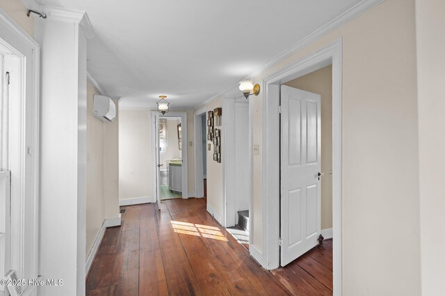 empty room with dark hardwood / wood-style flooring, crown molding, and ceiling fan