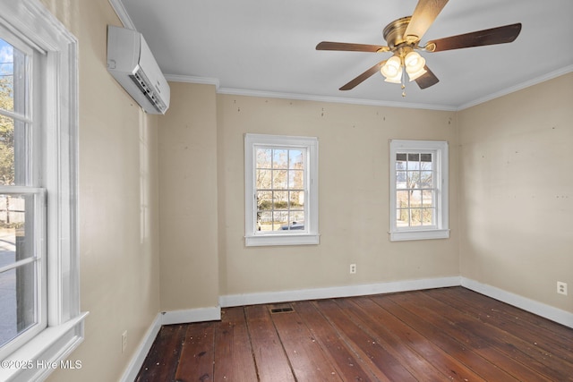 spare room featuring a wall mounted air conditioner, plenty of natural light, ornamental molding, and dark hardwood / wood-style floors