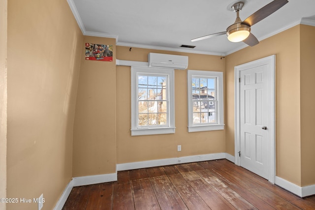 unfurnished bedroom featuring hardwood / wood-style floors, ornamental molding, and a wall unit AC