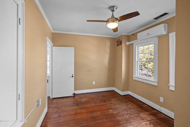 empty room featuring a wall mounted air conditioner, crown molding, dark hardwood / wood-style floors, and ceiling fan