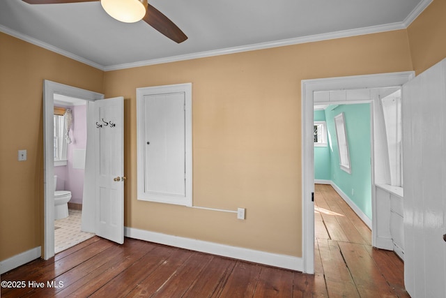 unfurnished bedroom with hardwood / wood-style flooring, ceiling fan, and ornamental molding