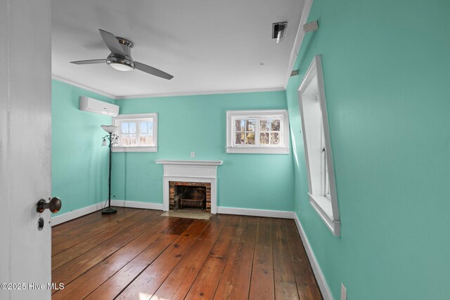 unfurnished living room with crown molding, ceiling fan, and dark hardwood / wood-style floors