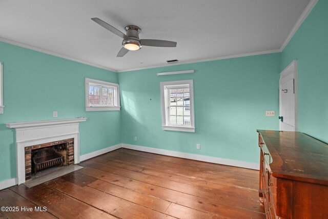 unfurnished bedroom featuring crown molding, ceiling fan, and dark hardwood / wood-style floors