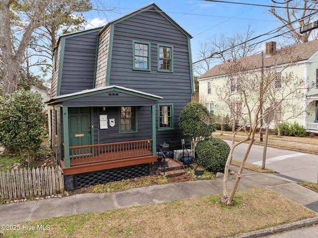 view of property with covered porch